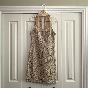 Gold tone dress worn once in great condition. Matching shell/scarf.